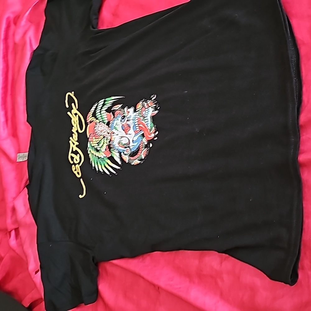 Ed Hardy T-shirt black with a really cool tattoo that has a skull and birds.
